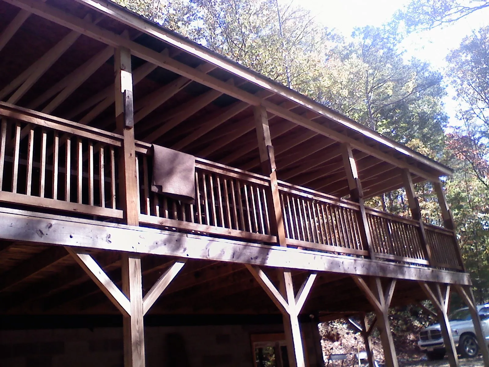 Timber framing under a new elevated porch and deck — Roof Leak Repair in Elk Park by Roofing Brothers